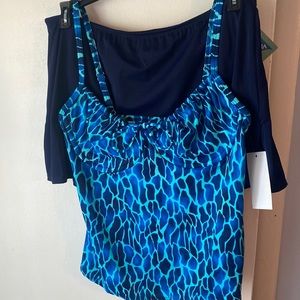 NWT Tankini. Size medium. Adjustable straps and underwire top. Skirt over brief.